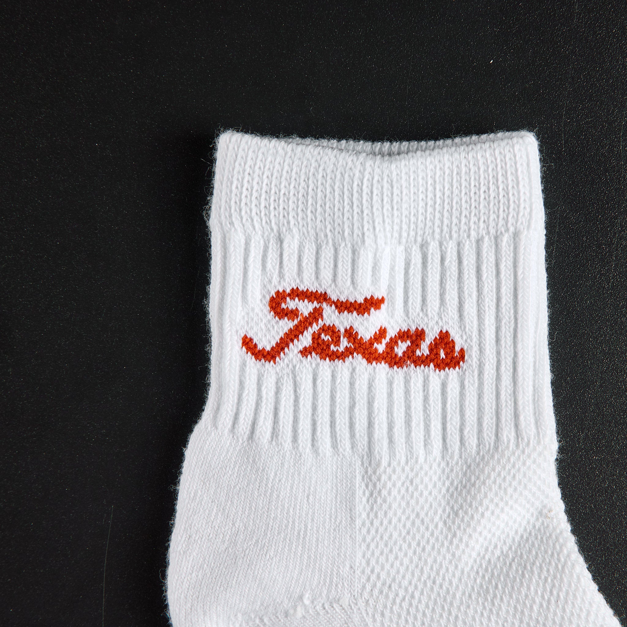 Del Campo Texas Longhorns Script golf socks, embroidered burnt orange Texas script wordmark detail