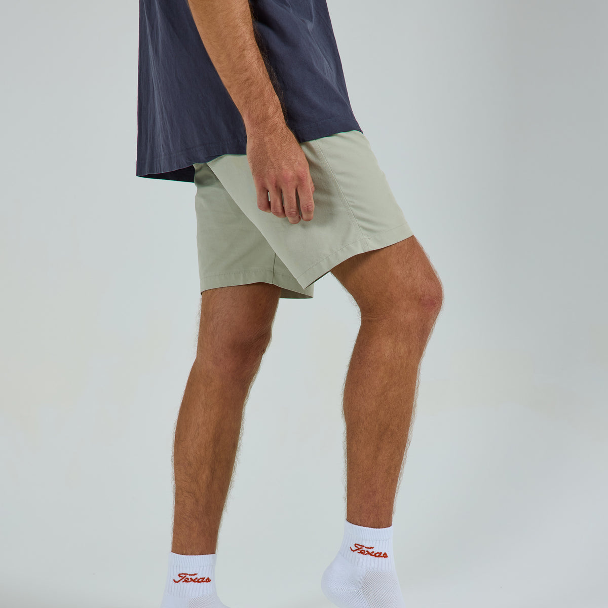 Del Campo Texas Longhorns Script golf socks on a male model in studio