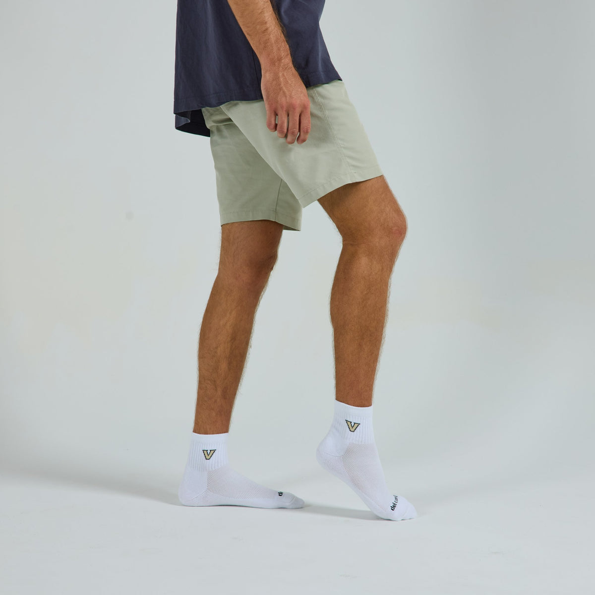 Del Campo Vanderbilt Commodores golf socks on a male model in studio