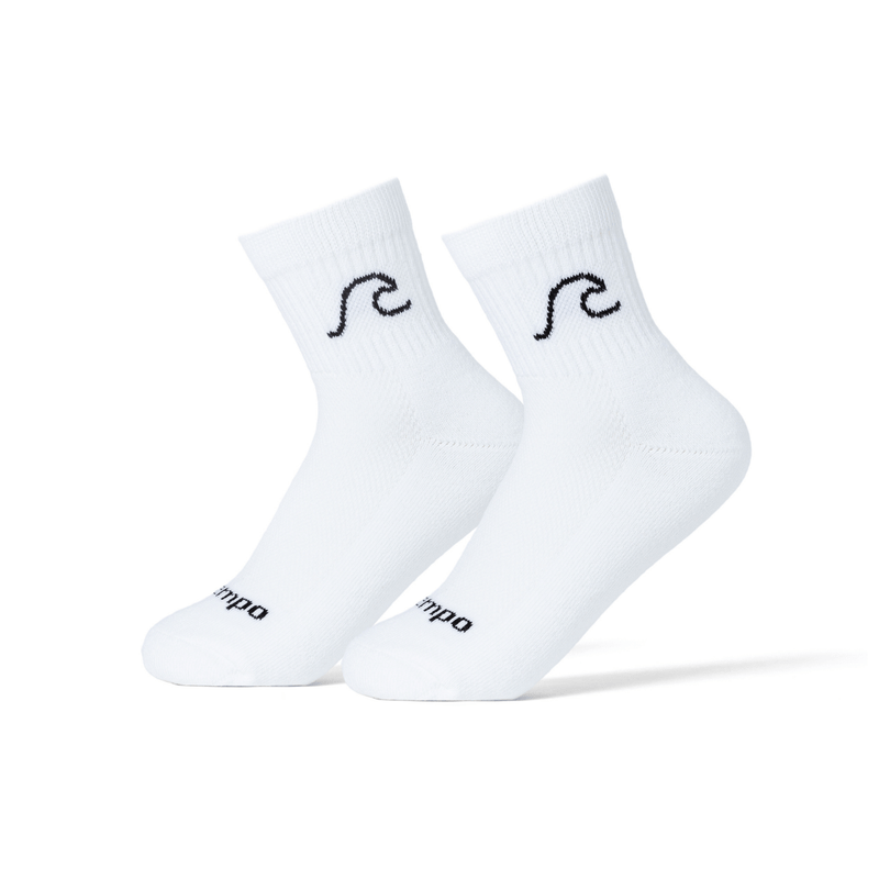 Pair of white Del Campo Golf Wavey socks with black logo on plain background | product