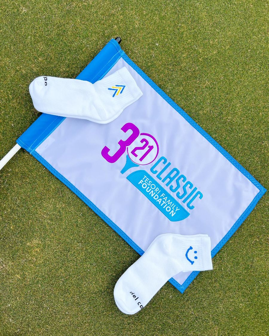 Custom Tesori Family Foundation logo golf socks by Del Campo